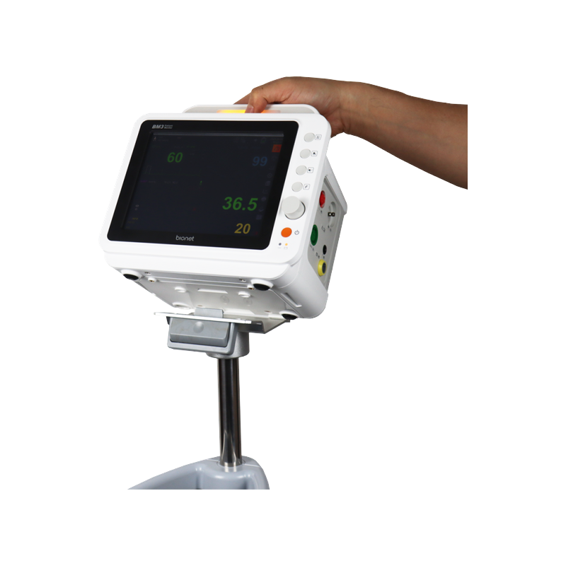 BM3 patient monitor mounted on rolling pole stand with healthcare professional hand demonstrating portability and bedside use